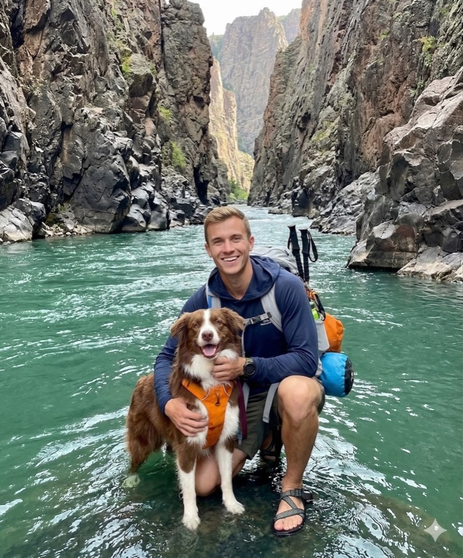Jake and his Australian Shepherd Riley in a desert canyon
